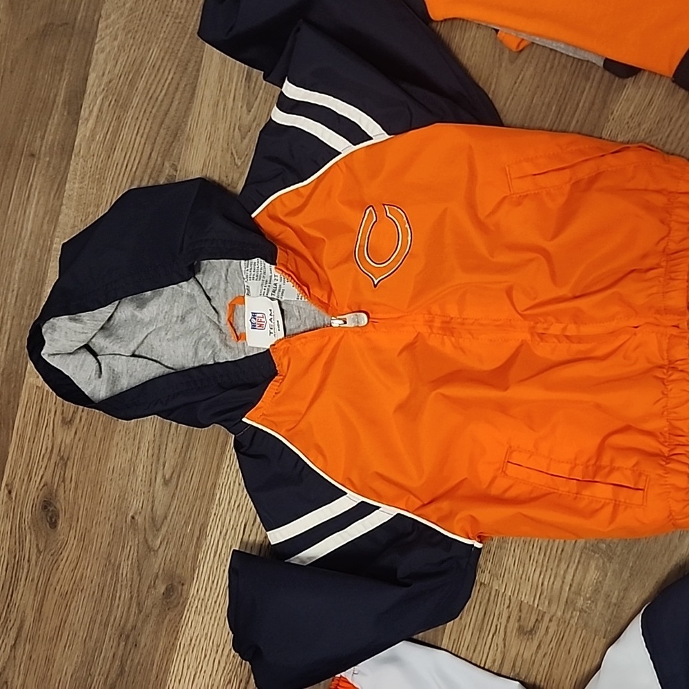 NFL Bears jacket 2T and a Reebok jacket 12 months